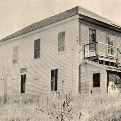 Grange Hall, on the Bunker Hill Road, Edmunds, Maine.: The structure was built as boarding house for mill workers in the early 20th century, and was purchased in the 20's by Ken Hodgdon for a garage, and later served as the Grange Hall
