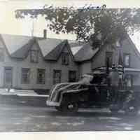          A Fourth of July Parade float passes the Cyrus Kilby House, on the Lane in Dennysville, Maine.
   