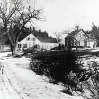          View of Cambridge and Hanson houses on the Preston (now River) Road, Edmunds, Maine; Left to right the homes of Harry Cambridge and John Hanson. The Hanson house later burned. For many years Keith and Joyce Damon owned and lived in the Cambridge house. He was the grandson of Harry Cambridge.
   