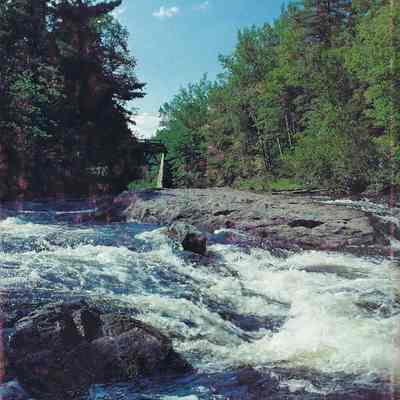 The Dennys River at Flat Rock Pool: Back Cover photo from "Salmon on the Dennys, 1786-1988", by Ed Bartlett and Ray Robinson, 1988.