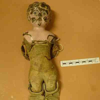 Minerva tin head doll
