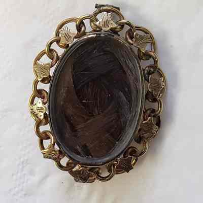 Gold brooch - braided hair inlay