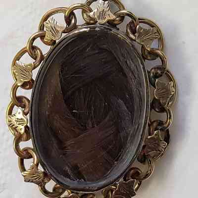 Gold brooch - braided hair inlay