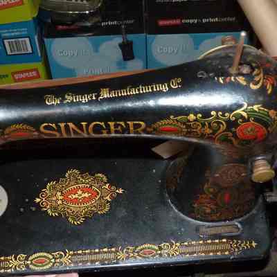 Singer sewing machine and cabinet