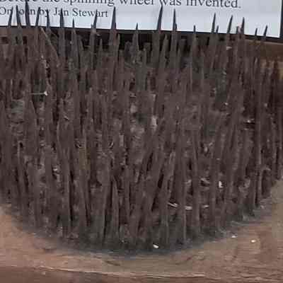 fiber hatchel and hand-spun flax