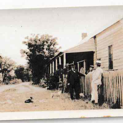Men at home of Mrs. Kate Harvey, Pinopolis