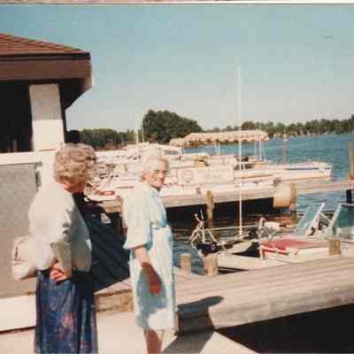 Two unidentified women at Black's Camp docks