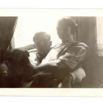 2024.17.1_029_Front: Likely Adolph Nilssen and his wife Marie Nilssen (née Anderson), sitting with a dog